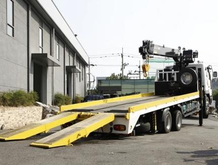 Низкорамный эвакуатор с платформой